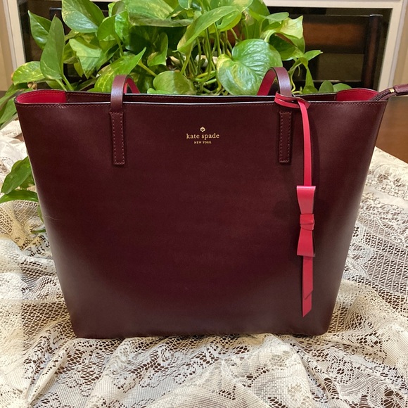 kate spade Handbags - Kate Spade Lawton Way Maroon / Pink Tote (ABBA)
